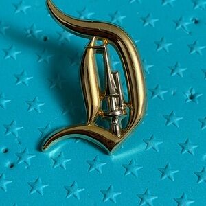 Disney D pin Gold and Silver with castle
